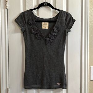 Hollister gray v-neck tee with rosette details at neckline